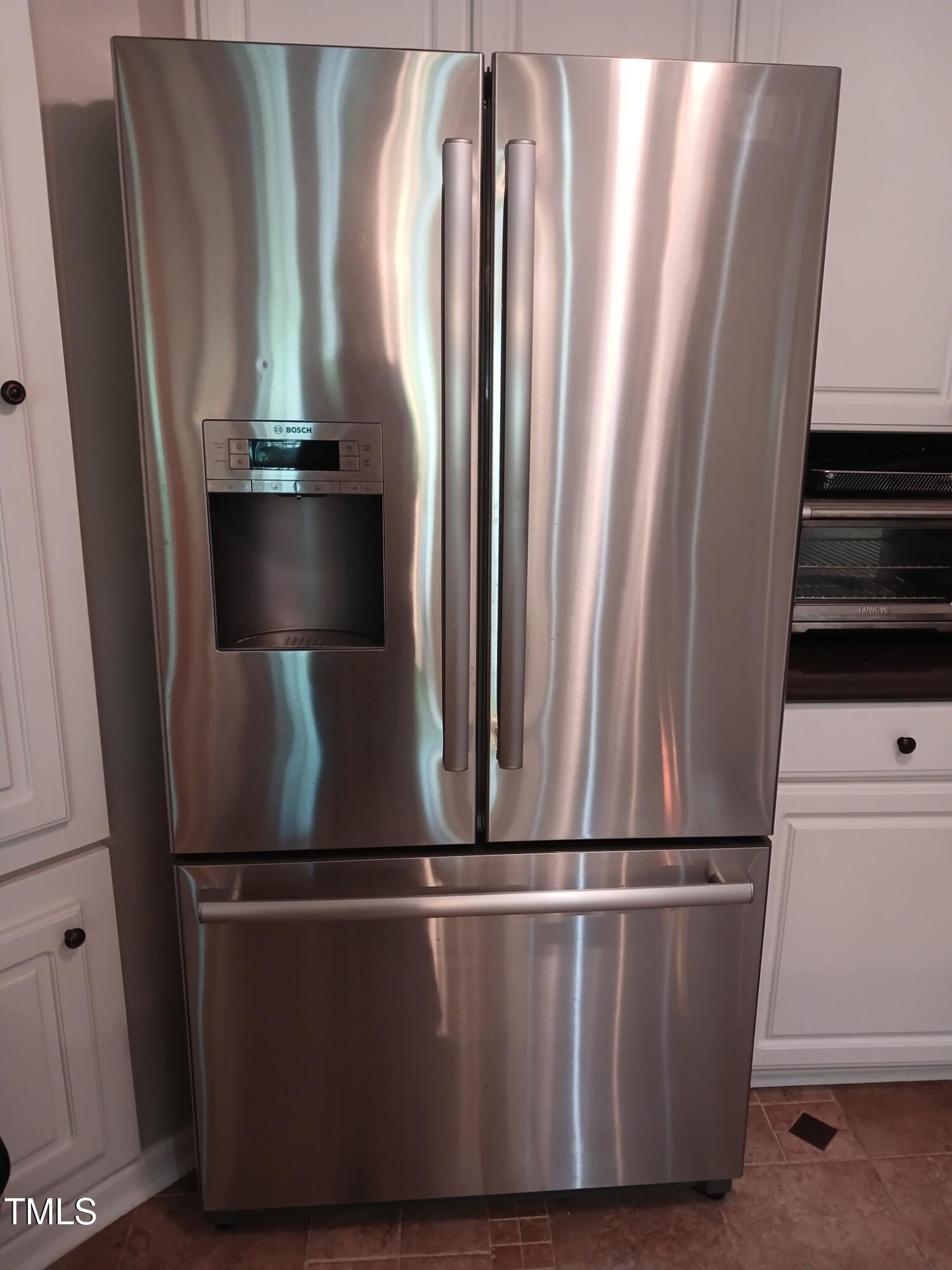 631 Springfork Drive Cary, NC 27513 - Photo 15 of 23 an empty room with wooden floor