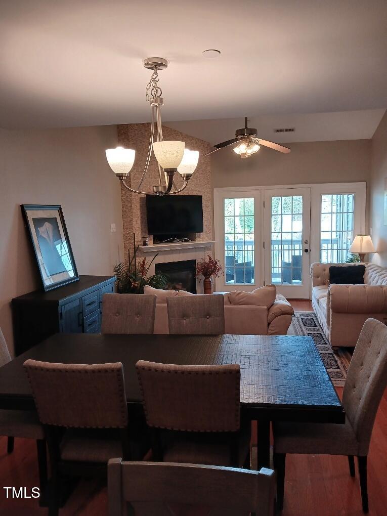 631 Springfork Drive Cary, NC 27513 - Photo 10 of 23 a living room with furniture and a fireplace