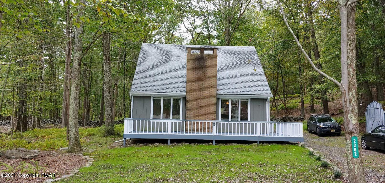 2202 Delaware Court East Bushkill, PA 18324 - Photo 2 of 18 front view of a house with a yard