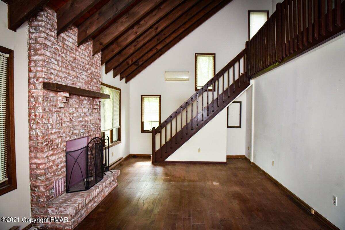 2202 Delaware Court East Bushkill, PA 18324 - Photo 10 of 18 a view of entryway with wooden floor