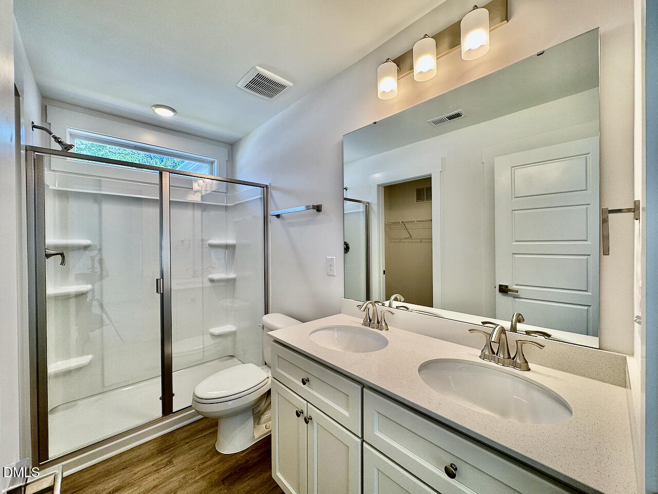 218 George Street, Unit A Four Oaks, NC 27524 - Photo 19 of 28 Owner Bath Double Vanity + Shower
