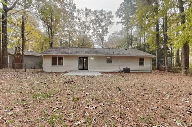 front view of a house with a dry yard