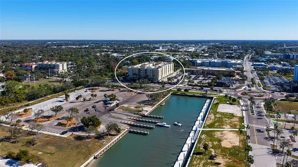 an aerial view of a house with a swimming pool