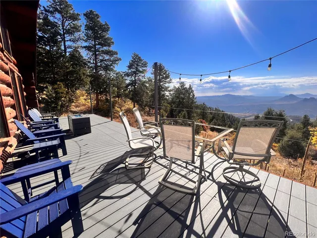 a view of a balcony with chairs