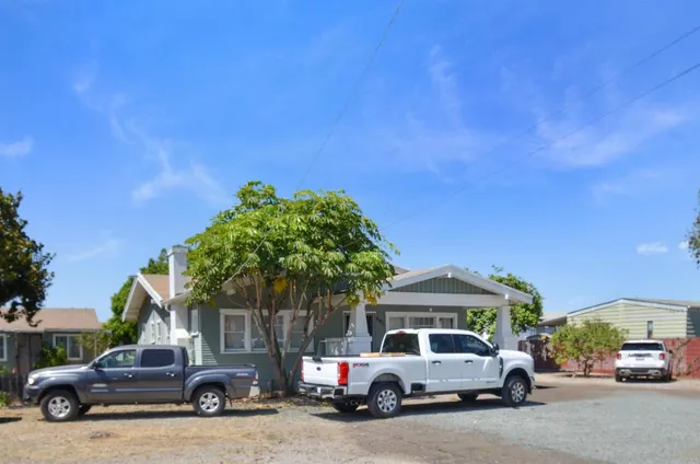 a car parked in front of a house