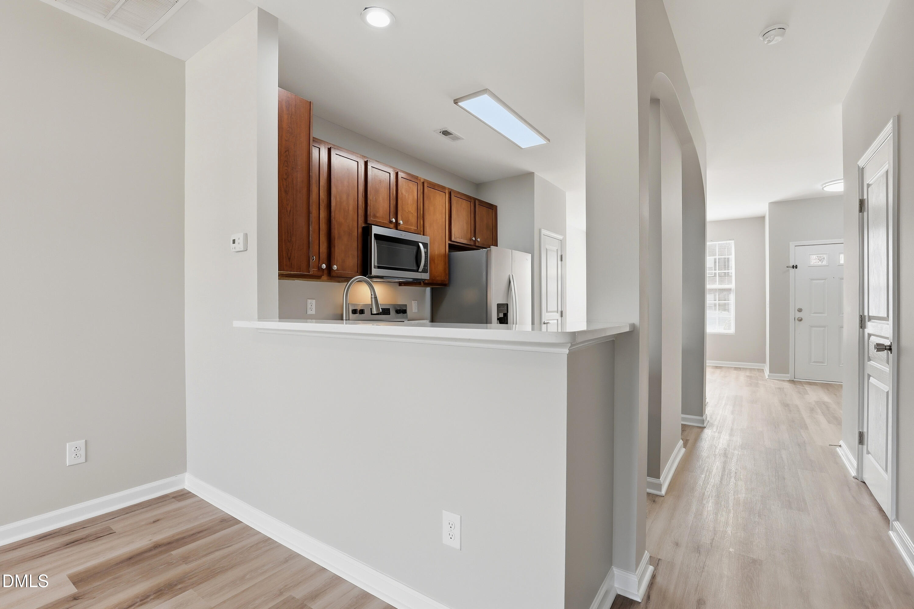 715 Bryant Street Raleigh, NC 27603 - Photo 14 of 25 a view of a kitchen from the hallway