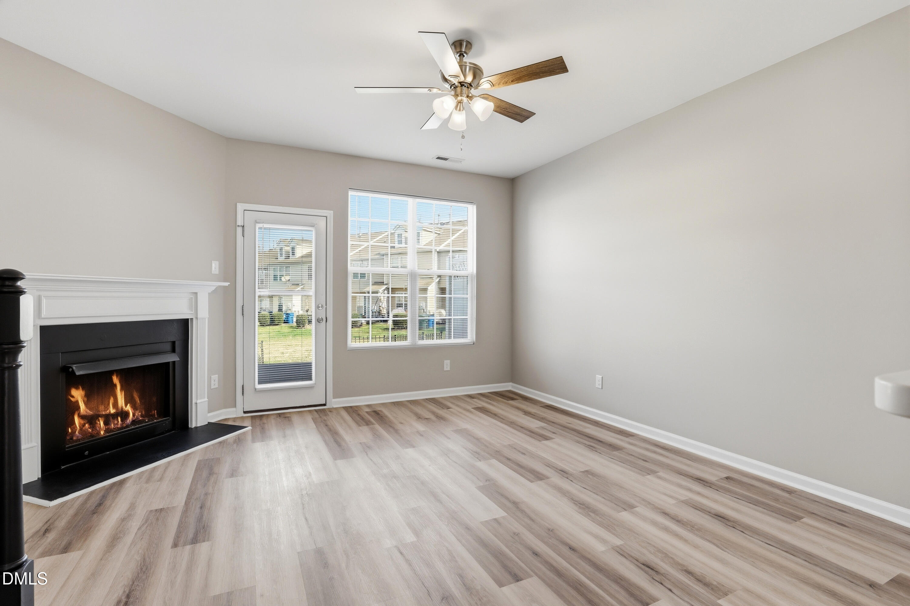715 Bryant Street Raleigh, NC 27603 - Photo 16 of 25 a view of an empty room with window and fire place