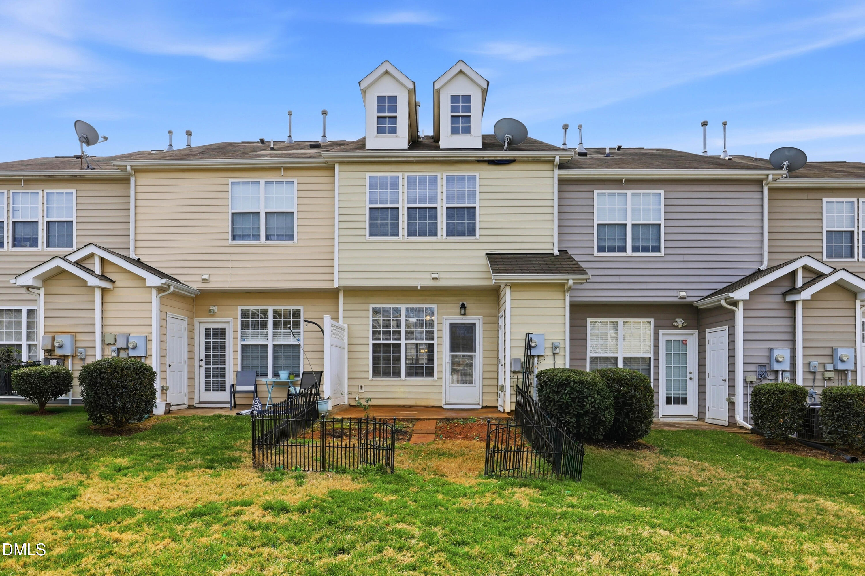 715 Bryant Street Raleigh, NC 27603 - Photo 25 of 25 a view of a house with backyard sitting area and garden