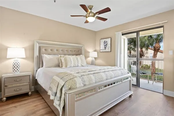 a bed room with a bed and a window