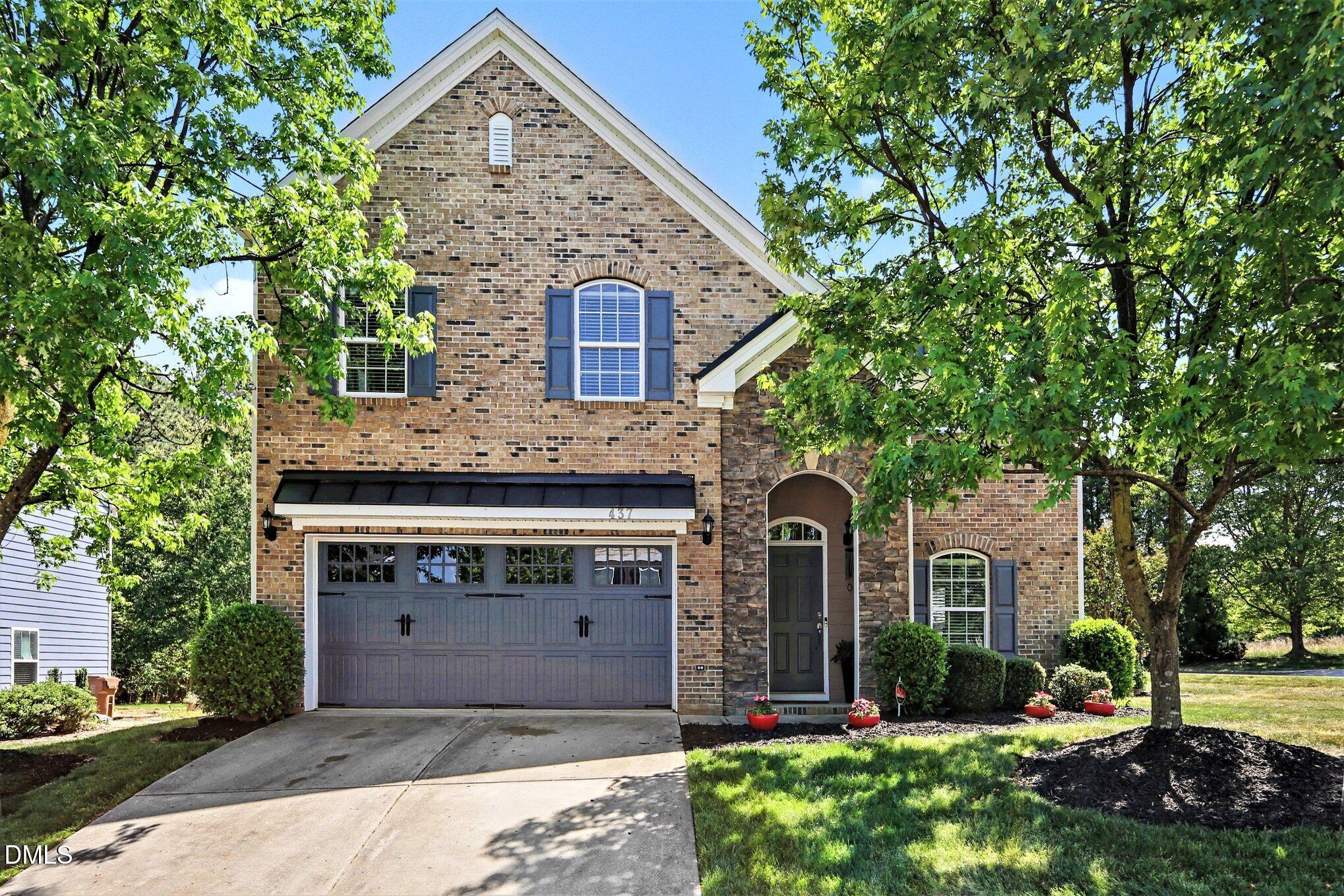 437 Field Glow Lane Apex, NC 27539 - Photo 2 of 48 front view of a house with a yard
