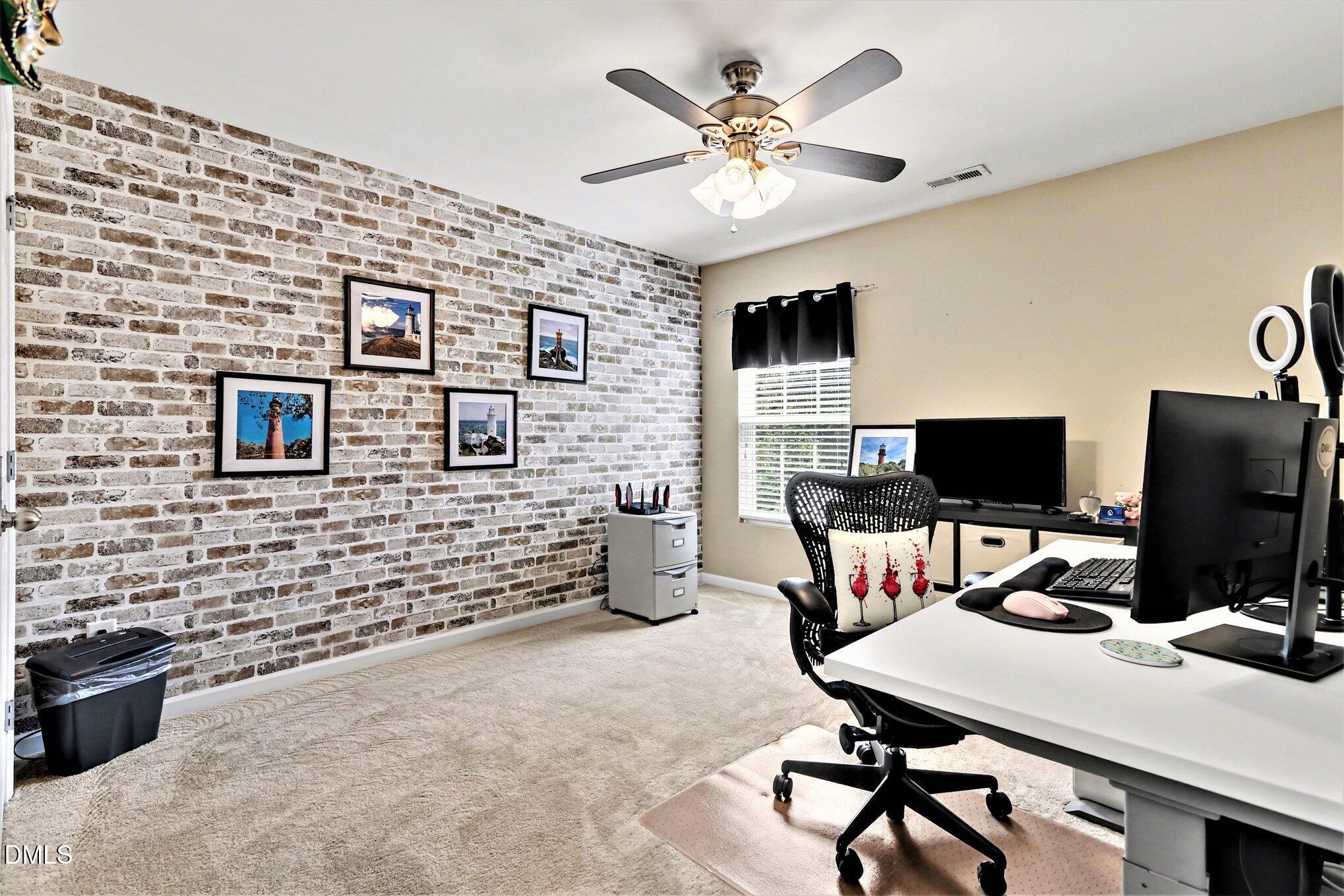 437 Field Glow Lane Apex, NC 27539 - Photo 27 of 48 a workspace with furniture