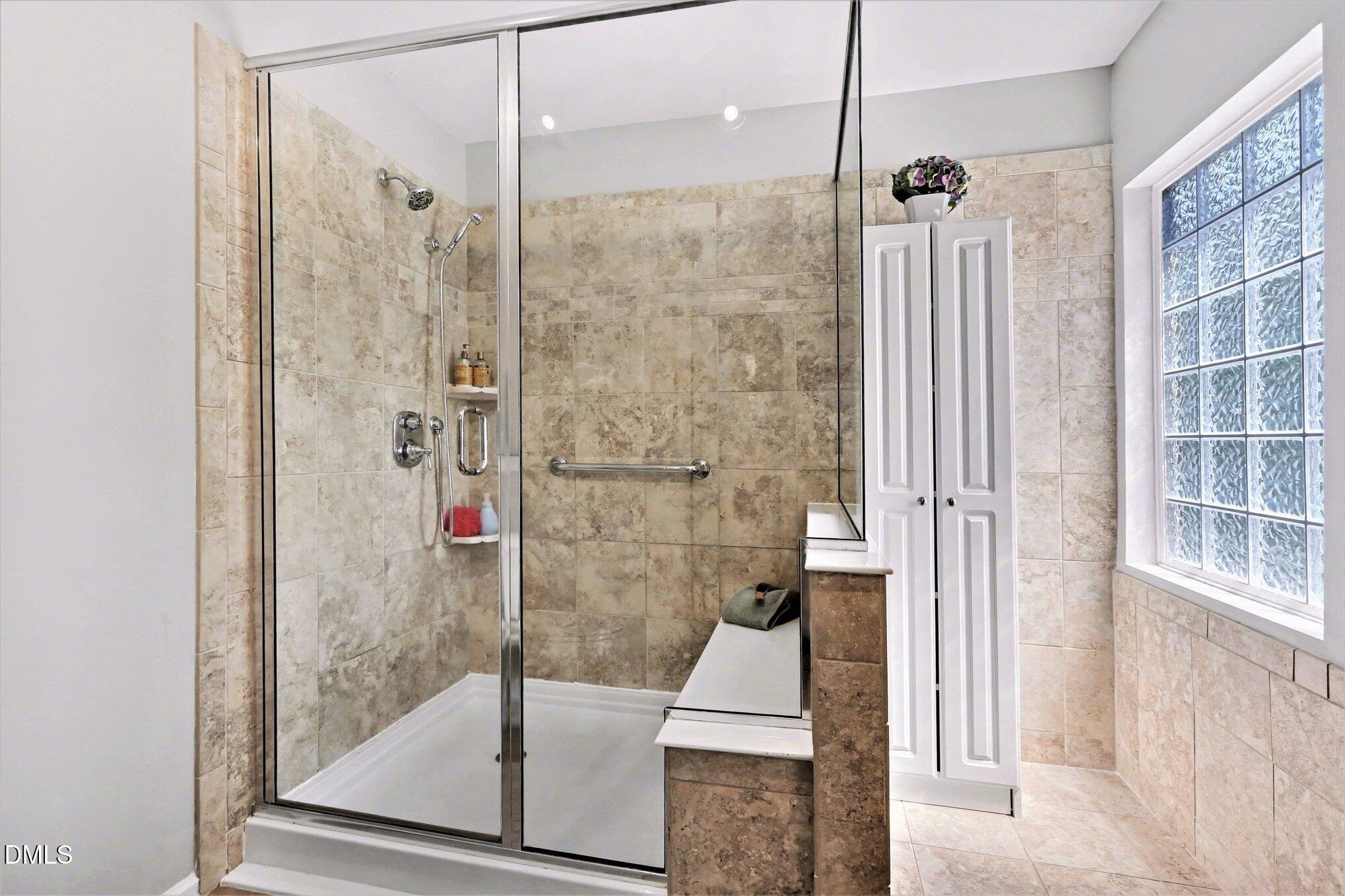 437 Field Glow Lane Apex, NC 27539 - Photo 31 of 48 a bathroom with a shower