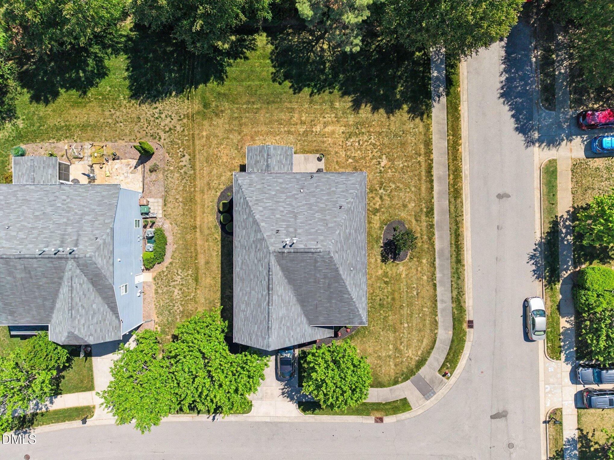437 Field Glow Lane Apex, NC 27539 - Photo 44 of 48 an aerial view of a house with a garden and plants