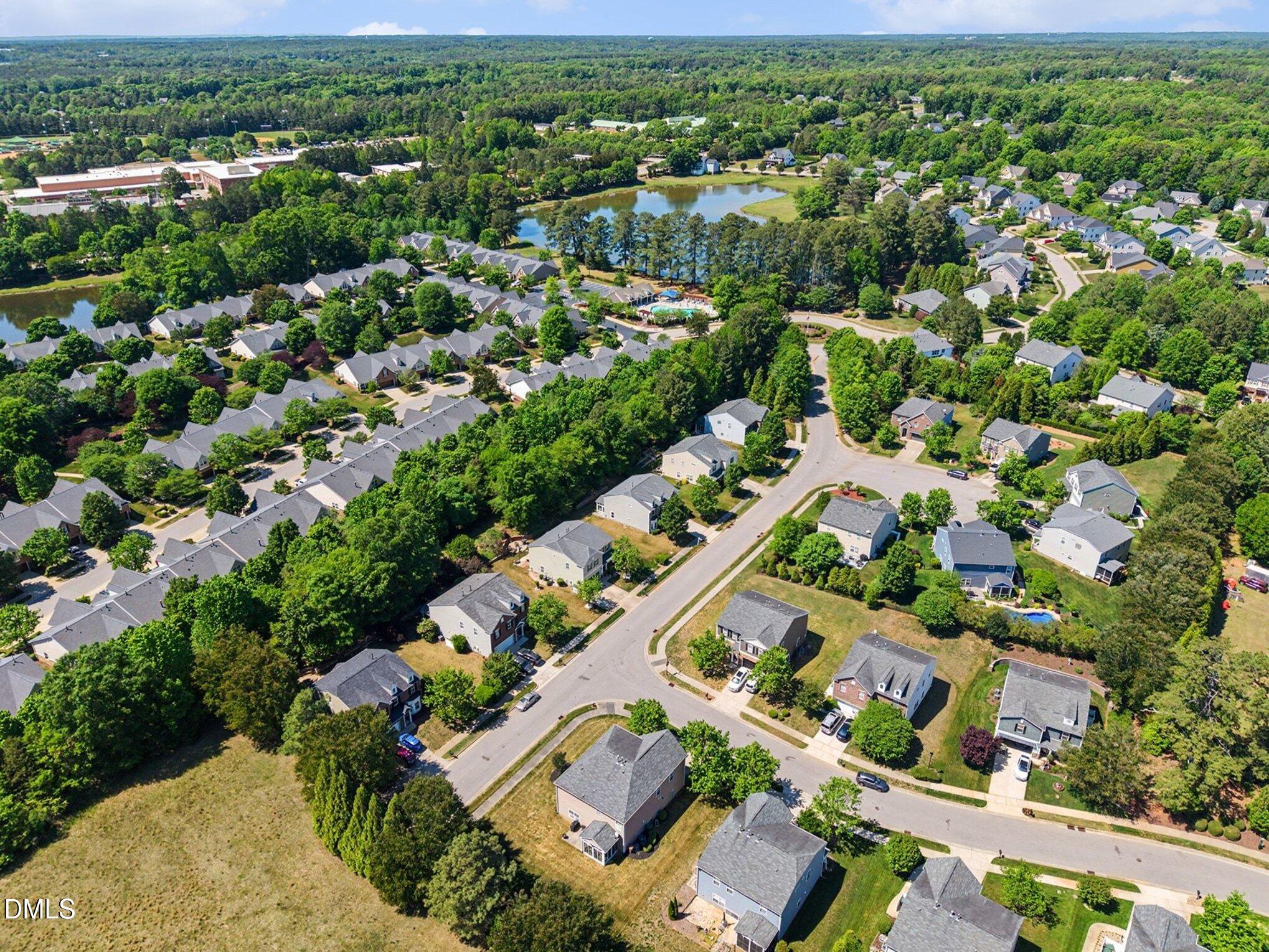 437 Field Glow Lane Apex, NC 27539 - Photo 46 of 48 an aerial view of residential houses with outdoor space