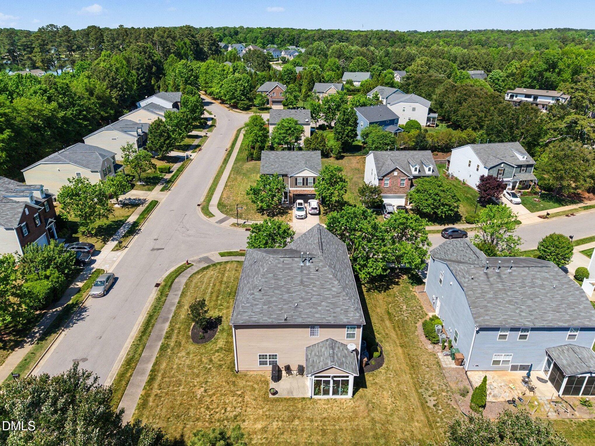 437 Field Glow Lane Apex, NC 27539 - Photo 47 of 48 an aerial view of a house with a garden