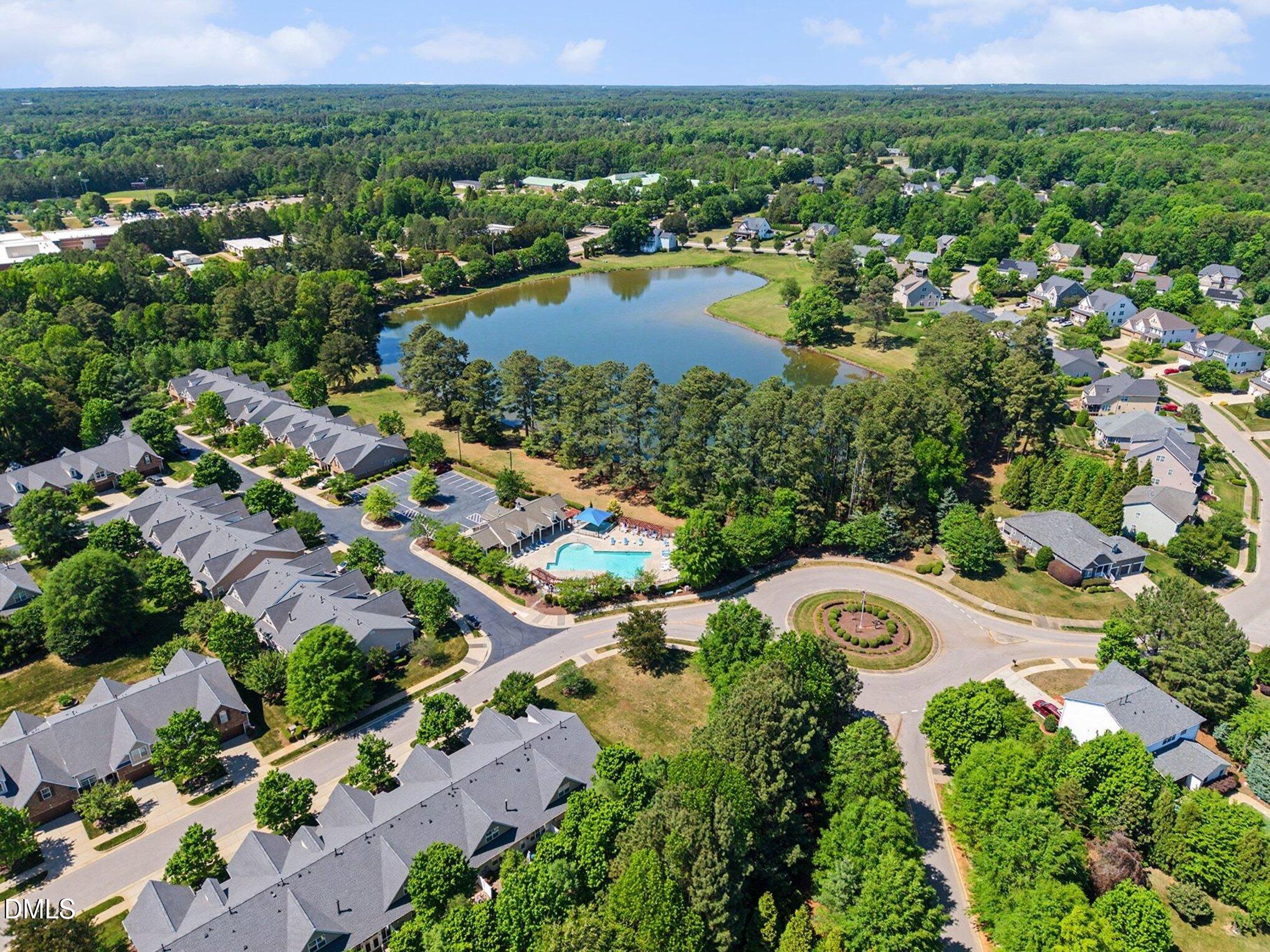 437 Field Glow Lane Apex, NC 27539 - Photo 48 of 48 an aerial view of residential house with outdoor space and river