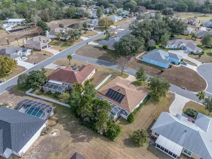 an aerial view of a house with a garden