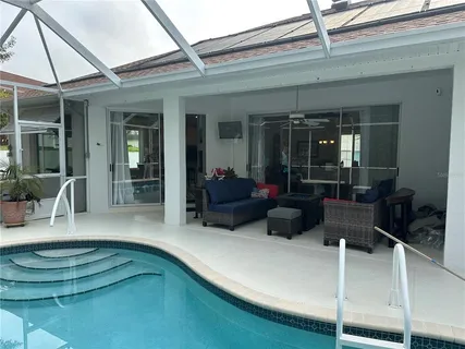 an aerial view of a house with a garden