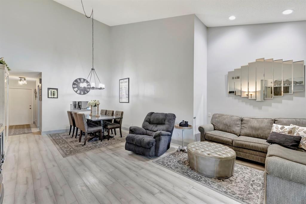 8799 Holly Court, Unit 202 Tamarac, FL 33321 - Photo 12 of 26 a living room with furniture and wooden floor