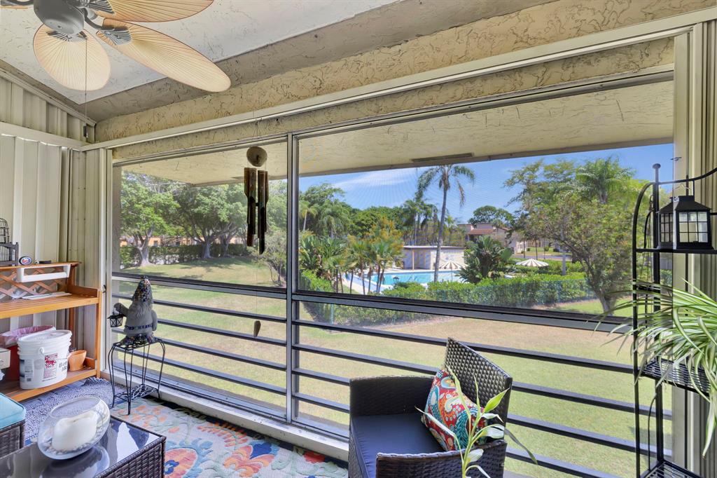 8799 Holly Court, Unit 202 Tamarac, FL 33321 - Photo 16 of 26 a view of a two chair in the balcony