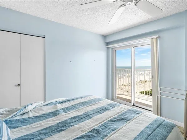 a view of balcony with furniture