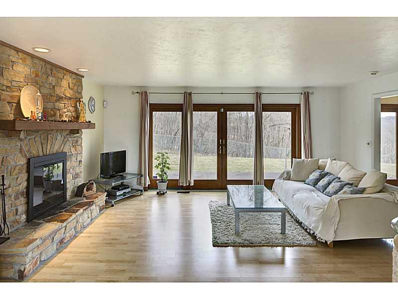 5760 Evans Road Export, PA 15632 - Photo 6 of 25 Family Room. with floor to ceiling stone fireplace