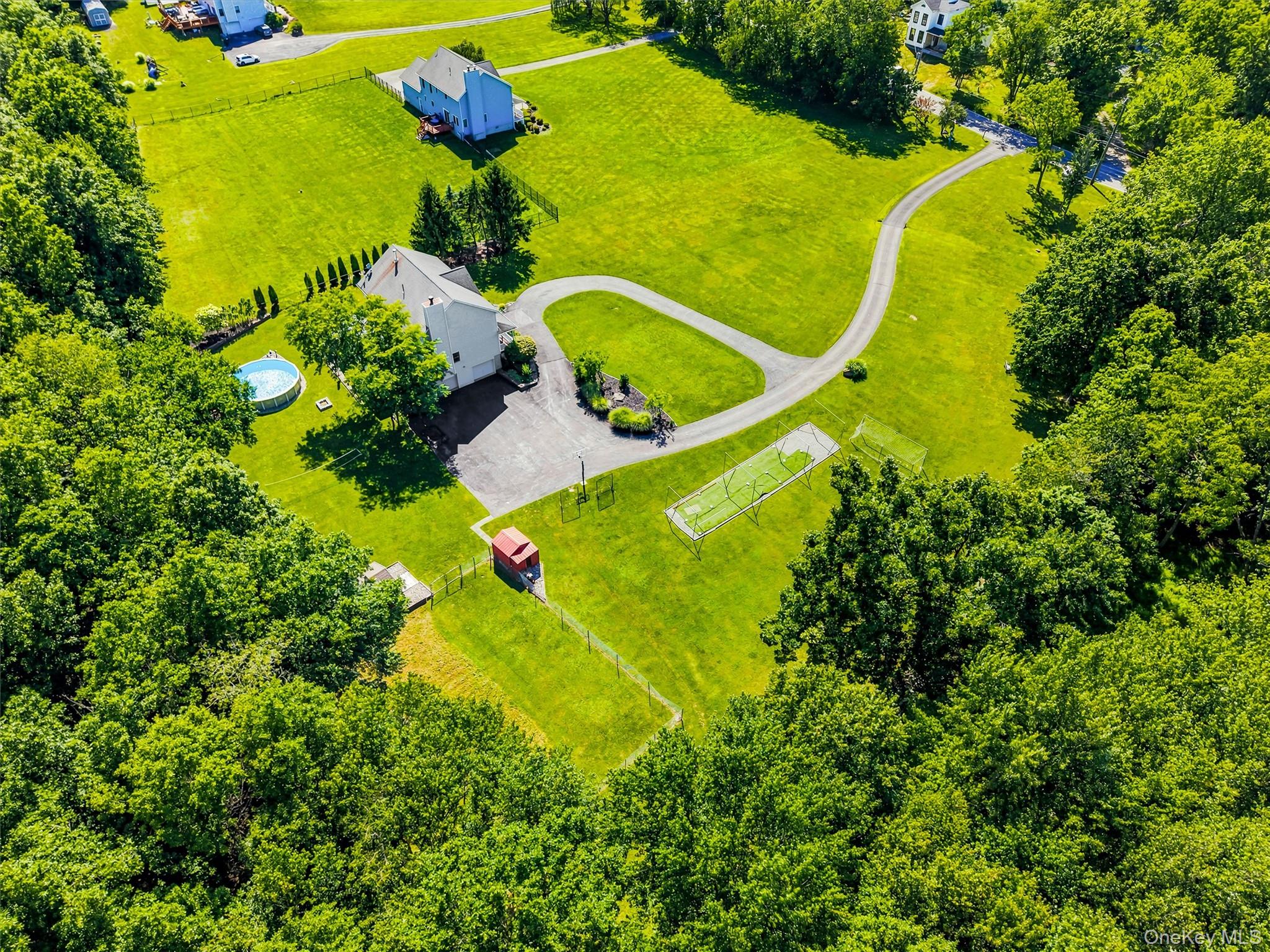 604 Ridgebury Road Slate Hill, NY 10973 - Photo 47 of 50 Aerial view of the side of the house and yard.