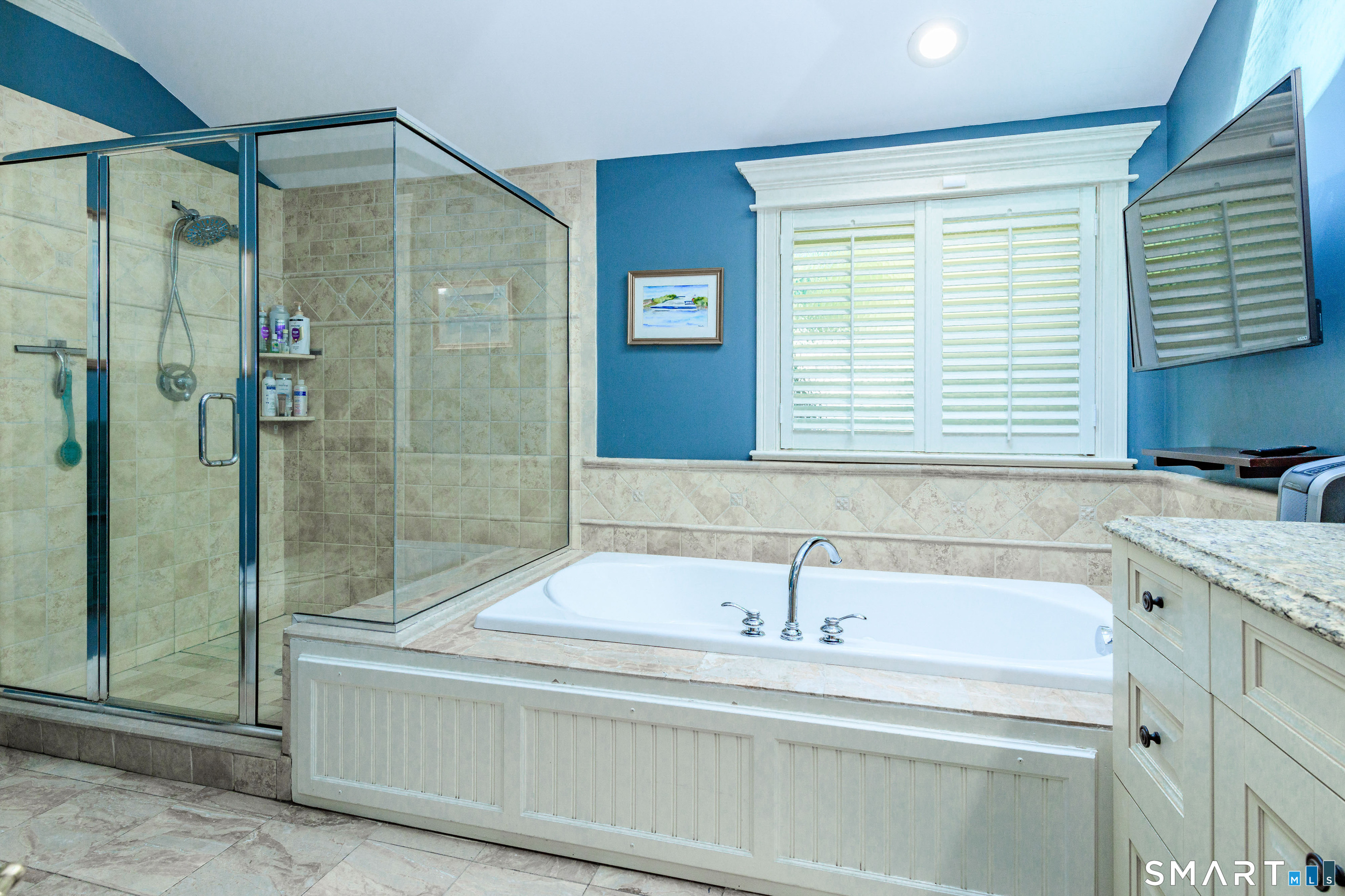 2 Bramble Bush, Unit 2 Avon, CT 06001 - Photo 20 of 40 a bathroom with a bathtub and a shower