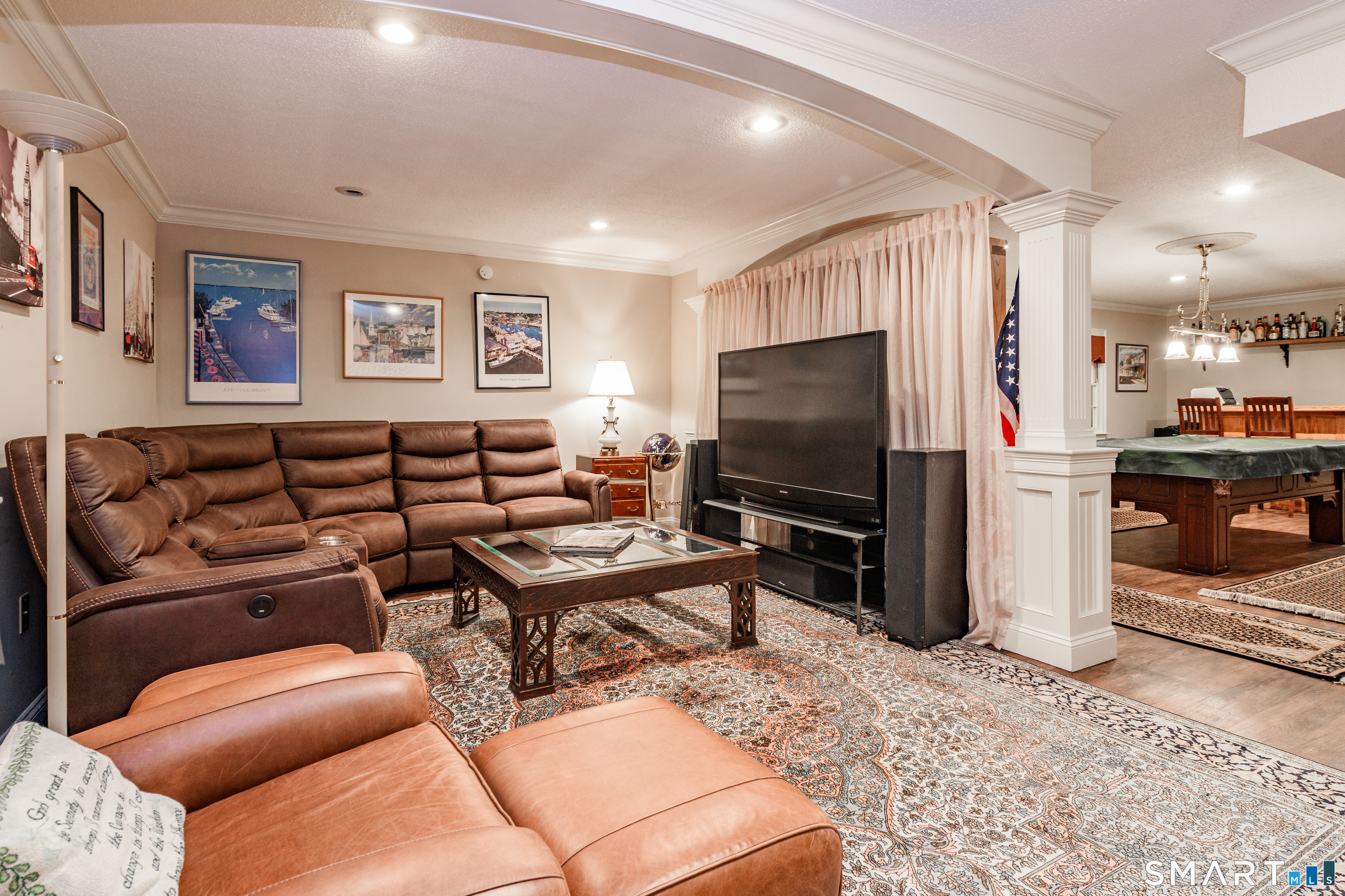 2 Bramble Bush, Unit 2 Avon, CT 06001 - Photo 27 of 40 a living room with furniture and a flat screen tv