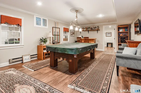 a view of a living room and dining area