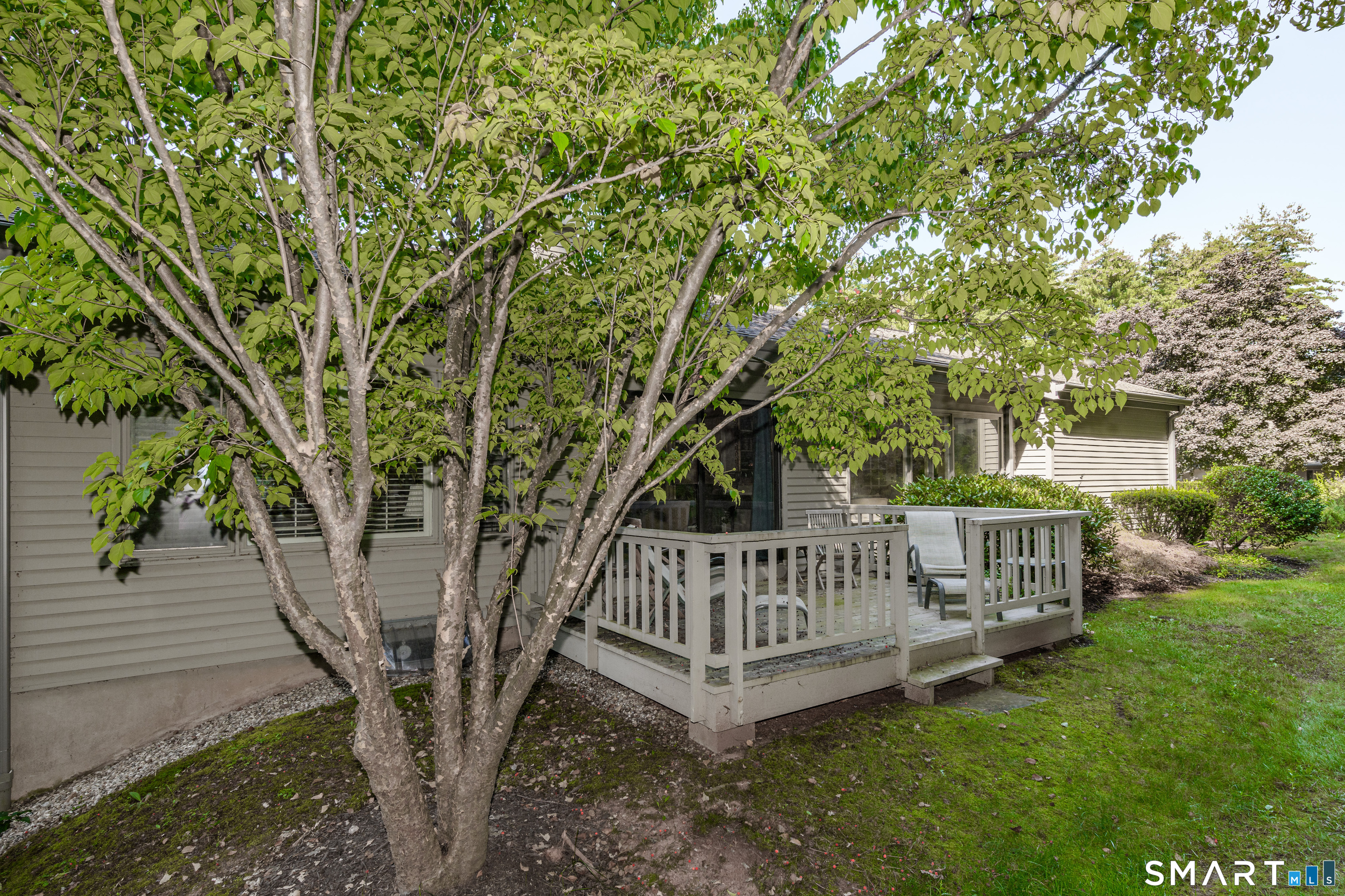 2 Bramble Bush, Unit 2 Avon, CT 06001 - Photo 36 of 40 a view of a house with a yard