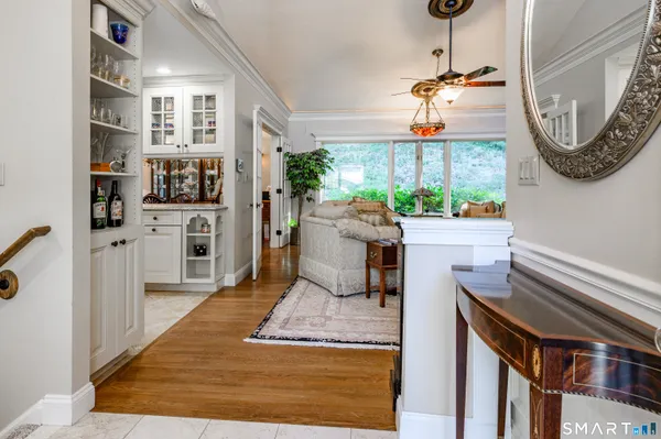 a living room with furniture and a window