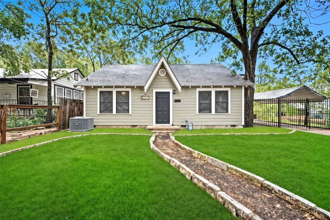 a house view with a garden space
