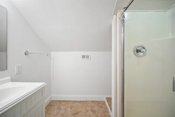 a view of small space with racks on the wall