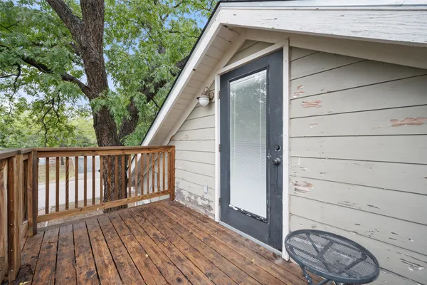 front view of a house with a trees