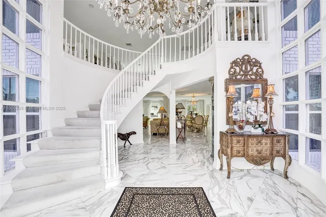 a view of a chairs and table in a room
