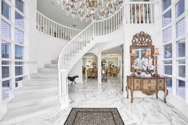 a view of a chairs and table in a room