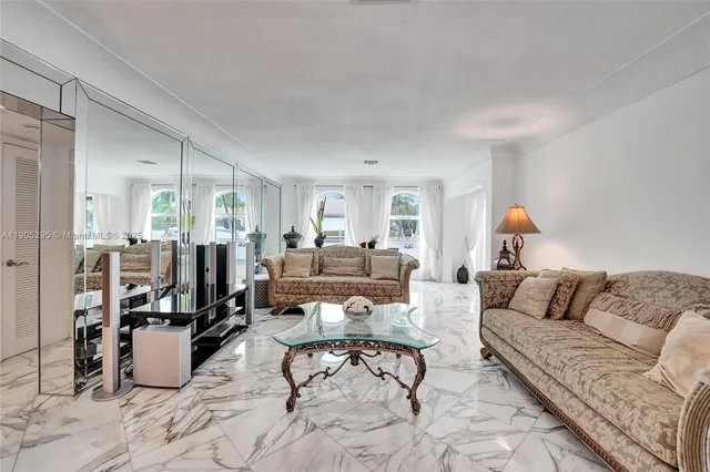 a kitchen with stainless steel appliances a stove and cabinets