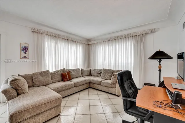 a living room with furniture and a couch