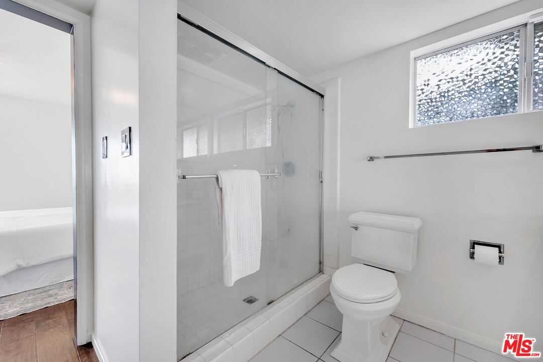 2050 Glentree Drive Lomita, CA 90717 - Photo 18 of 36 a bathroom with a toilet and a shower