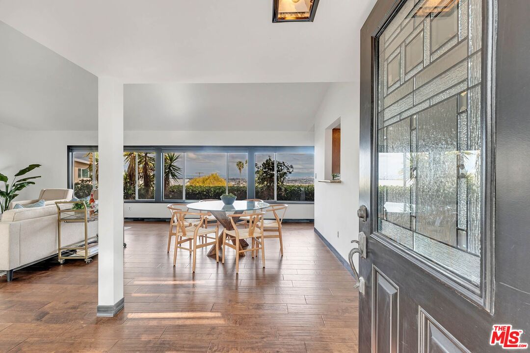 2050 Glentree Drive Lomita, CA 90717 - Photo 2 of 36 a view of a patio with dining table and chairs