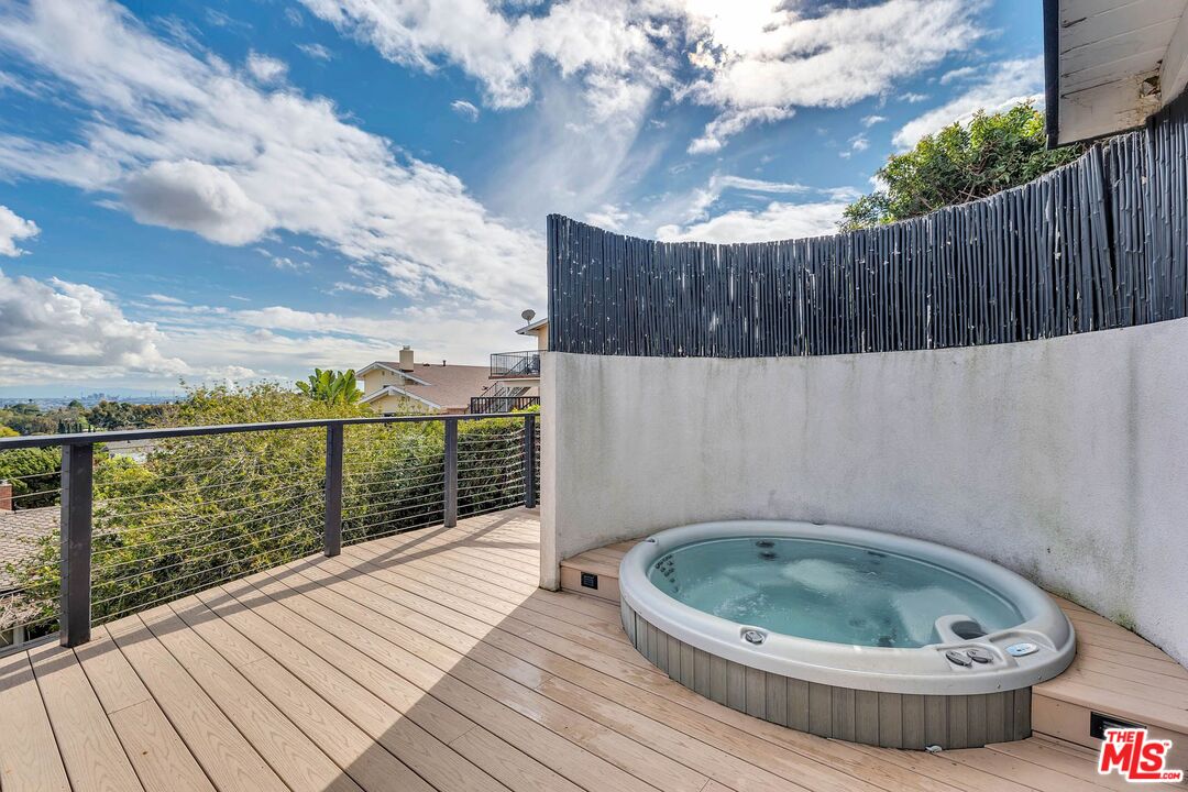 2050 Glentree Drive Lomita, CA 90717 - Photo 27 of 36 a table and chair in wooden floor