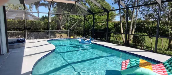 a view of swimming pool with a patio