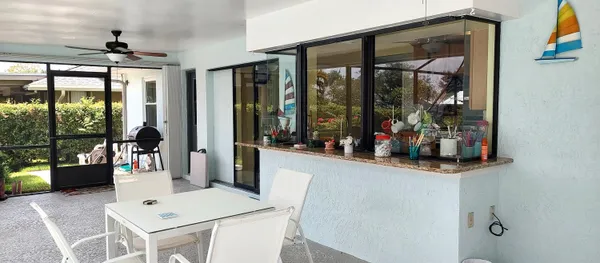 a backyard of a house with lots of green space and garden