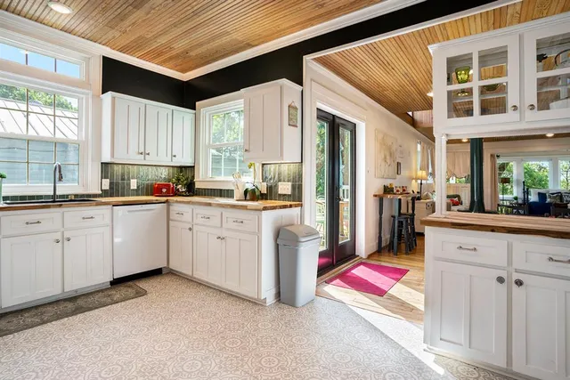 a kitchen with cabinets and sink