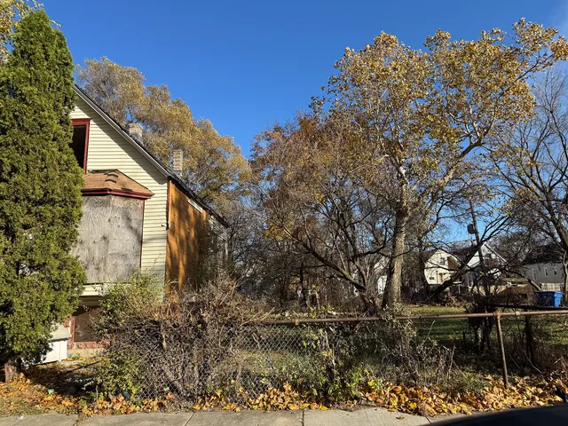 a backyard of a house with lots of green space