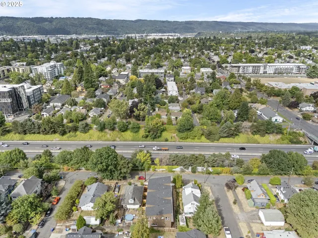 a view of a city with an ocean