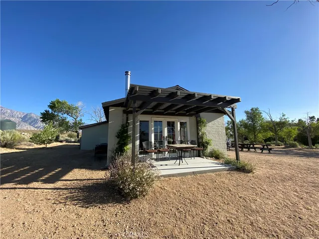 a living room with furniture and a outdoor space