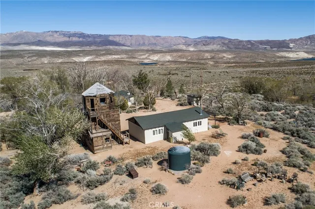 a view of a city with mountains in the background