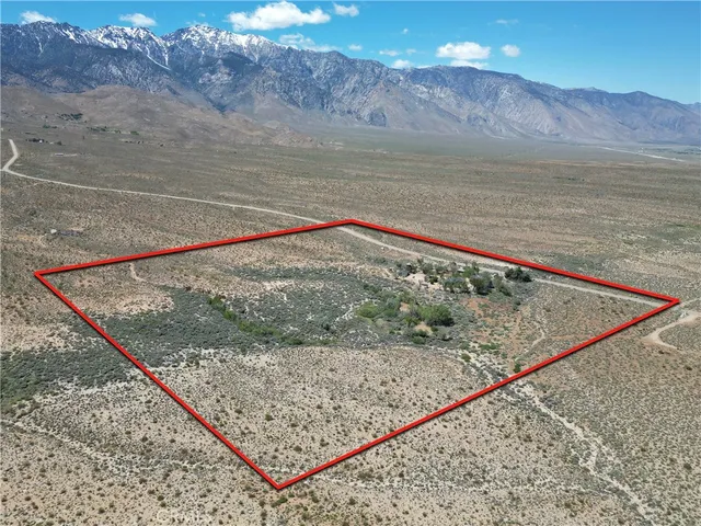 a view of a town with mountain in the background